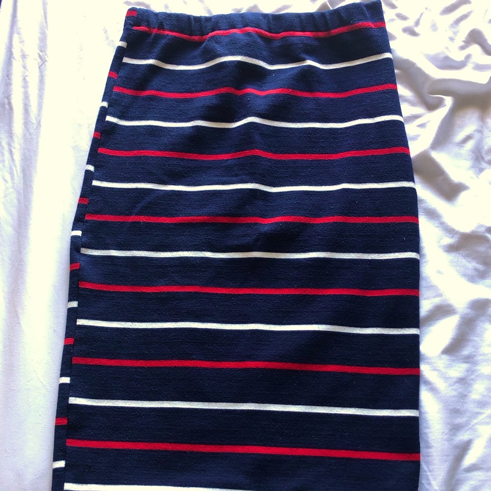 Navy red and white striped skirt that falls below the knee